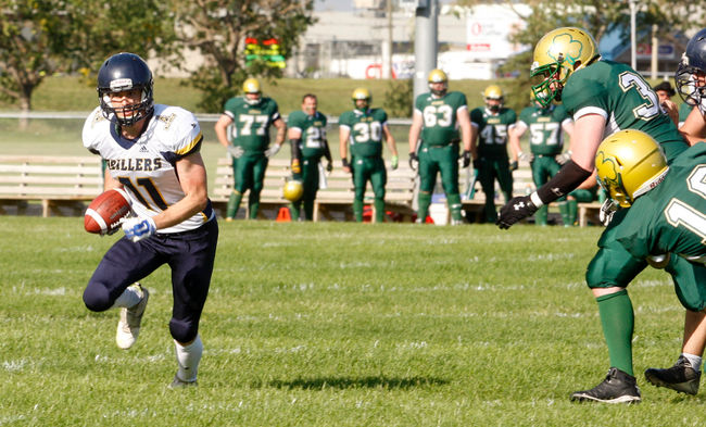 Symon Pfau, of the Grande Prairie Drillers, finds an opening to run the ball up field against the Airdrie Irish, in Alberta Football League play on Saturday at Legion Field. The Drillers won 16-10. Logan Clow/Grande Prairie Daily Herald-Tribune/Postmedia Network